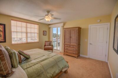 Impact sliding glass doors open to screened in porch