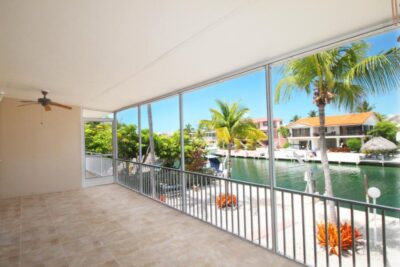 Screened in Porch overlooking the cana