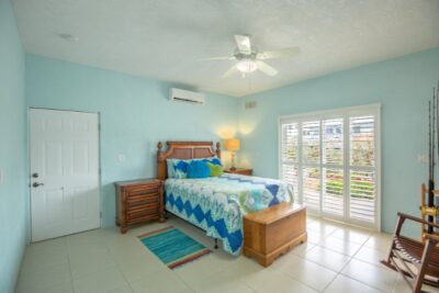 Downstairs Guest Room that opens up to the dock and garage