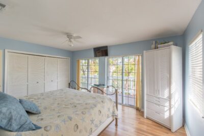 Master Bedroom with Double Sliding Glass Doors to Balcony