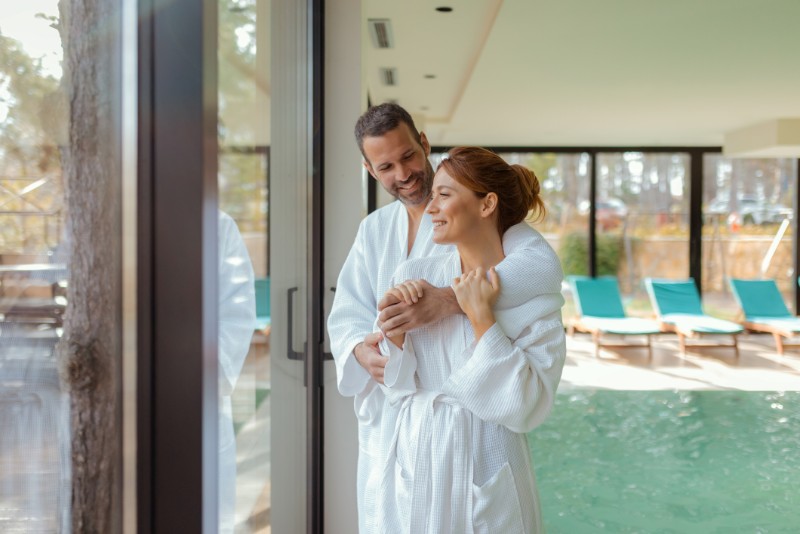 Tranquil Spa Moment - Couple Embracing by the Pool