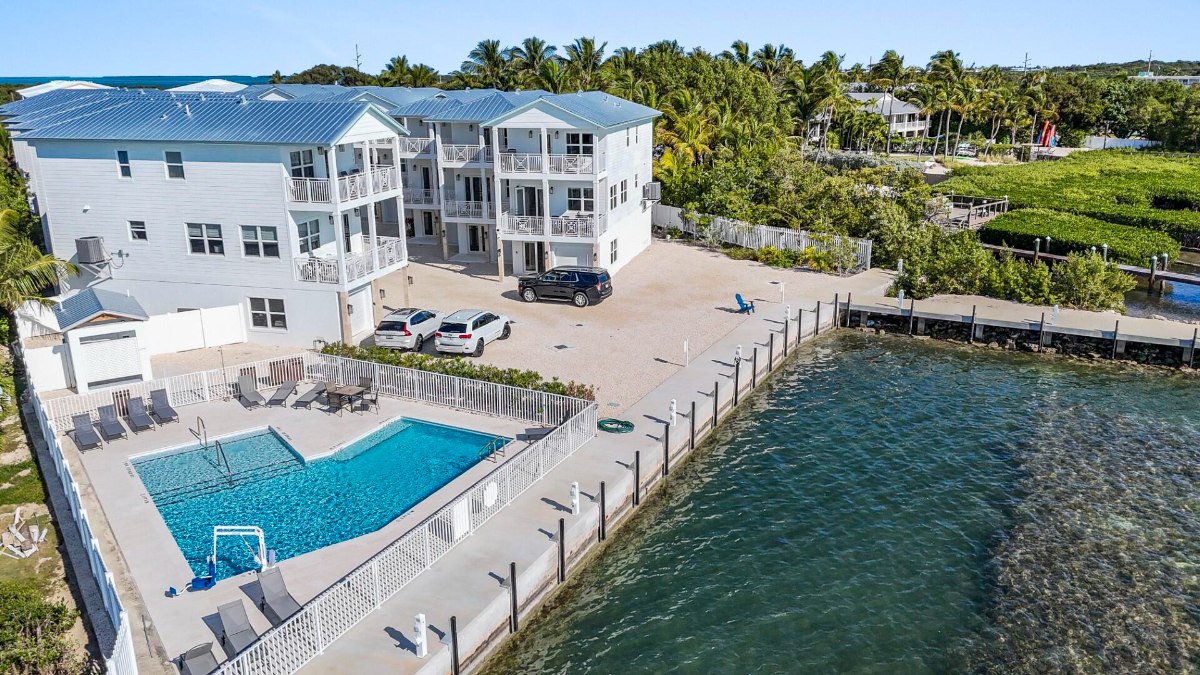 condo with the aerial view of the pool